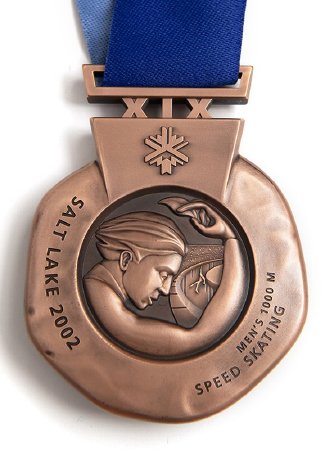 Back: Salt Lake bronze medal, Nike with speed skating image and text