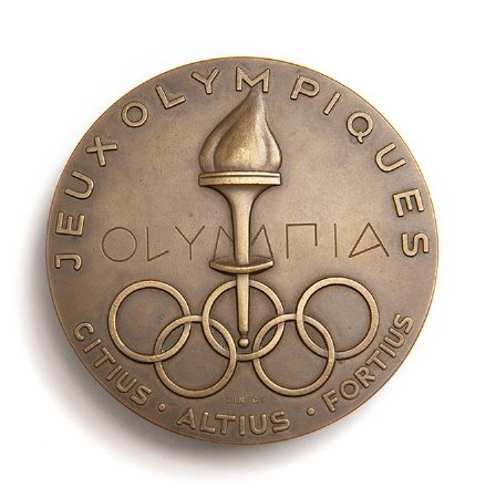 Front: Oslo 1952 bronze medal, raised torch set in Olympic Rings & legend